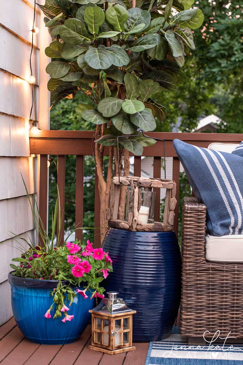 String lights draping over deck and down the side of house