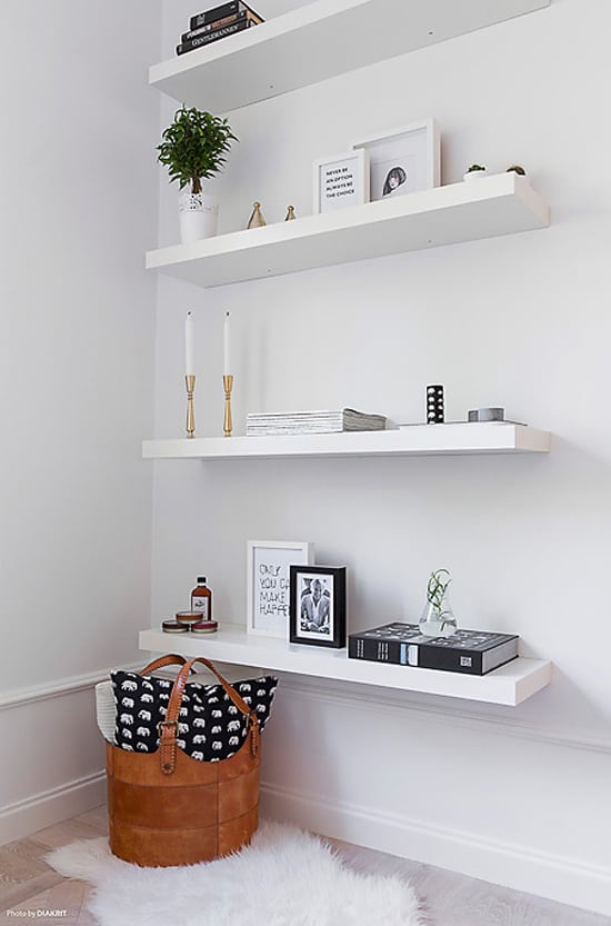 When you have a small bedroom, adding shelves is a clever way to add more storage. When you don't have the floor space for more furniture, think up!