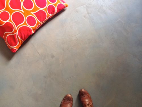 Concrete overlay over existing subfloor for a cheap flooring solution