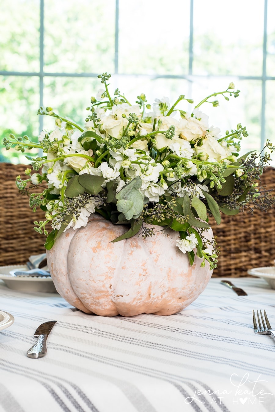 pumpkin filled with fresh flowers