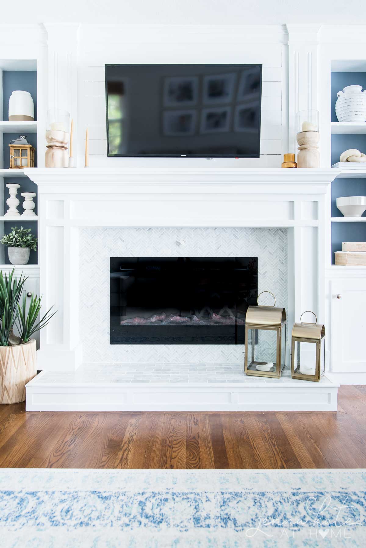 fireplace with neutral white fireplace mantle