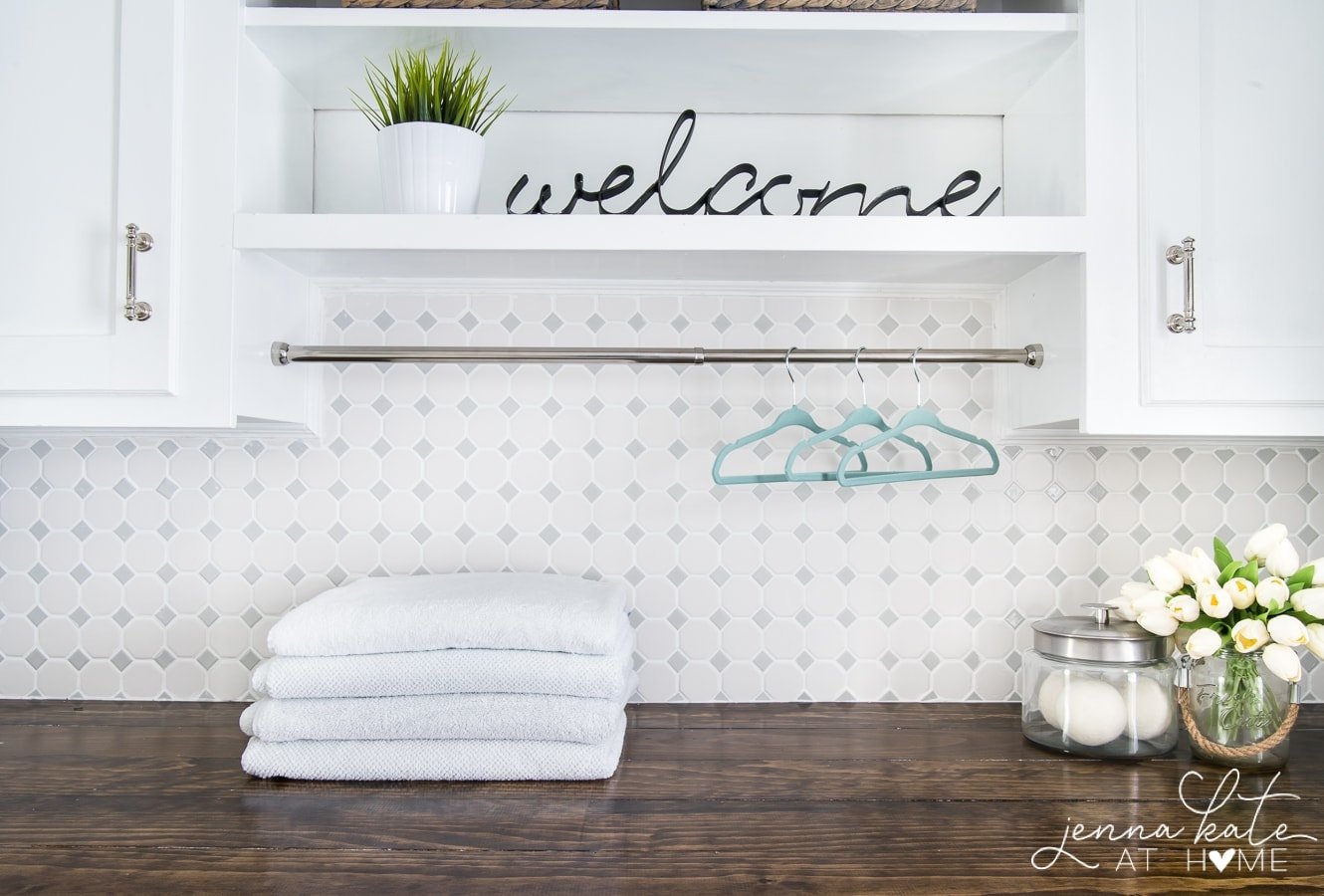 Laundry room makeover with DIY counter top and moroccan tile vinyl floor stickers