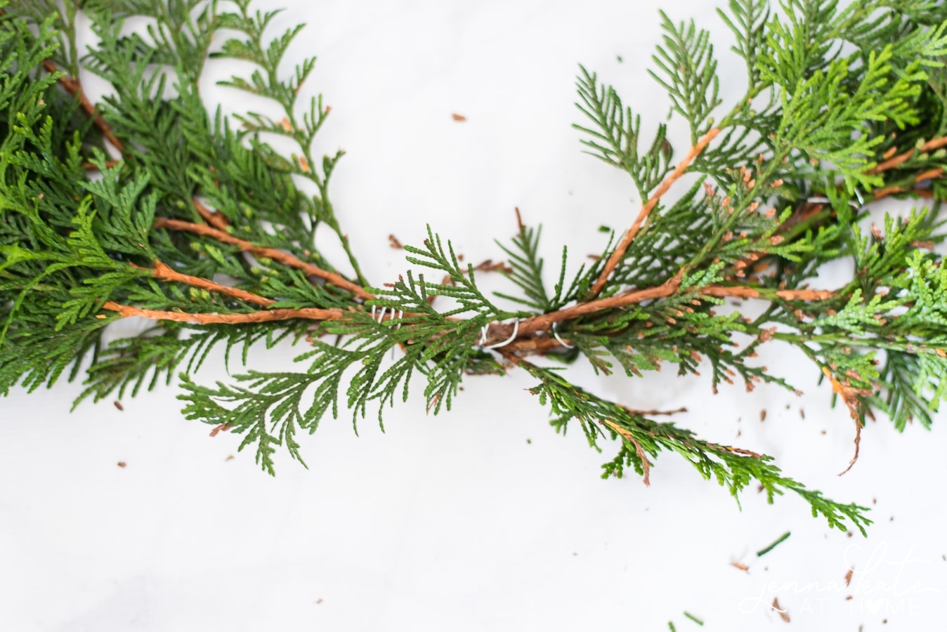 DIY Wire Coat Hanger Evergreen Christmas Wreath - Jenna Kate at Home