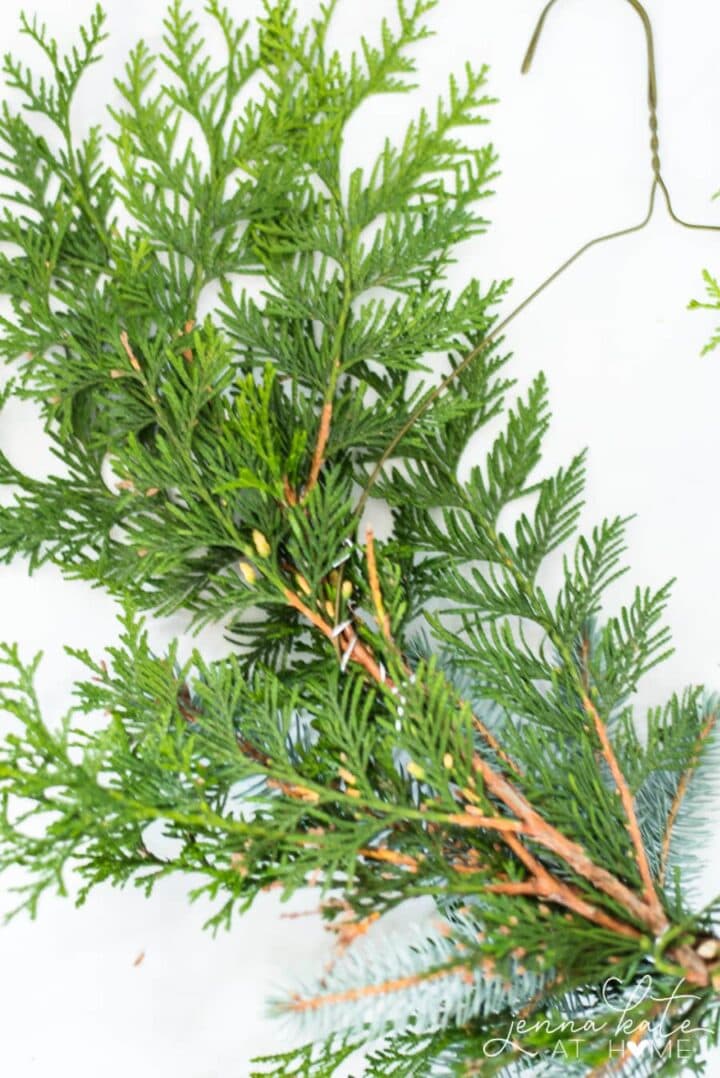 DIY Wire Coat Hanger Evergreen Christmas Wreath Jenna Kate at Home