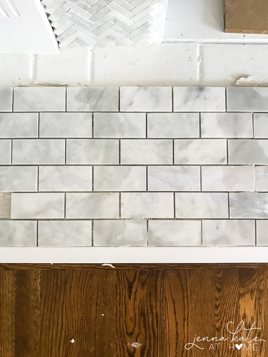 Can you tile over a brick fireplace? Yes!