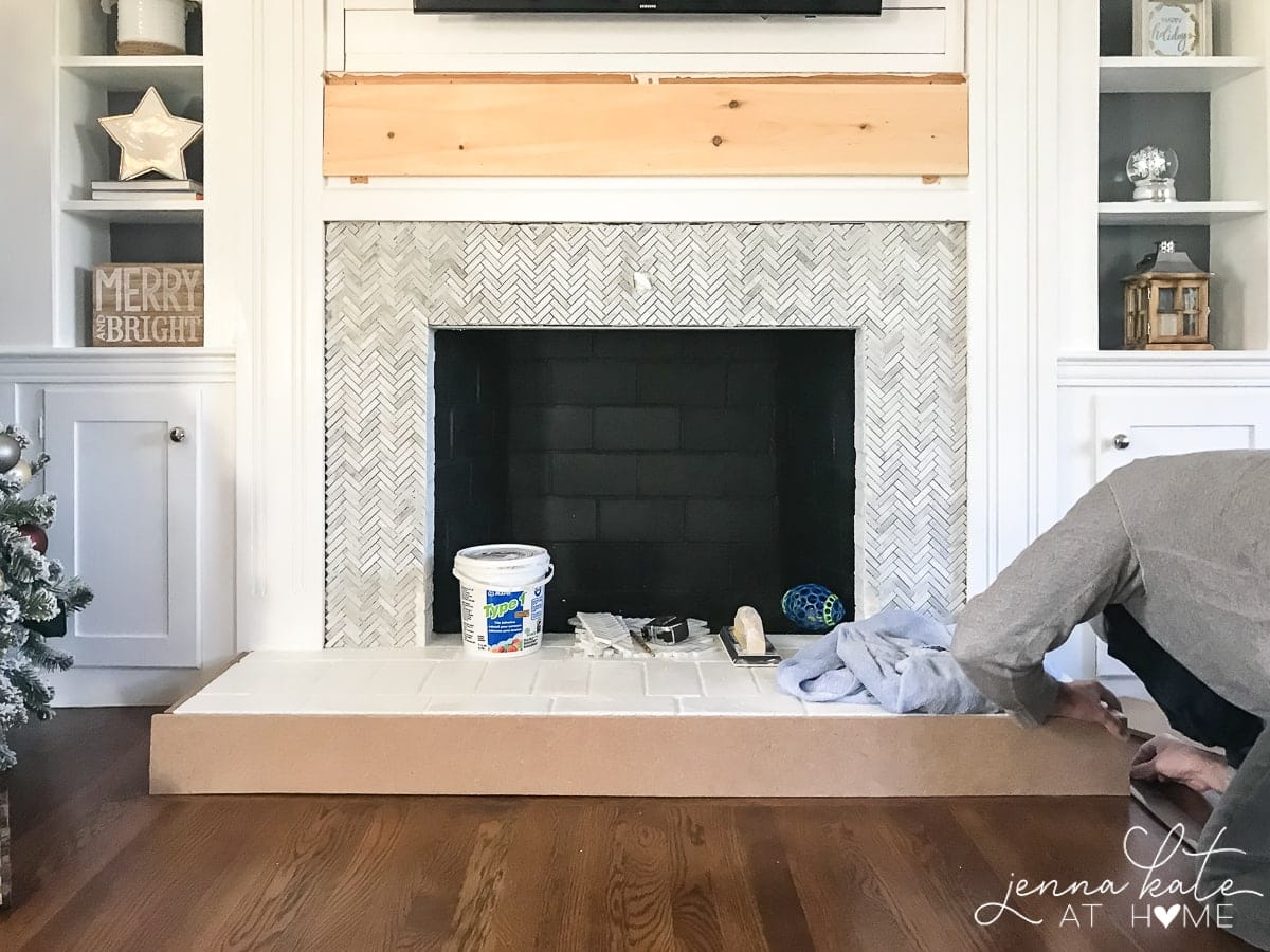 Simple tutorial on how to tile over a brick fireplace 
