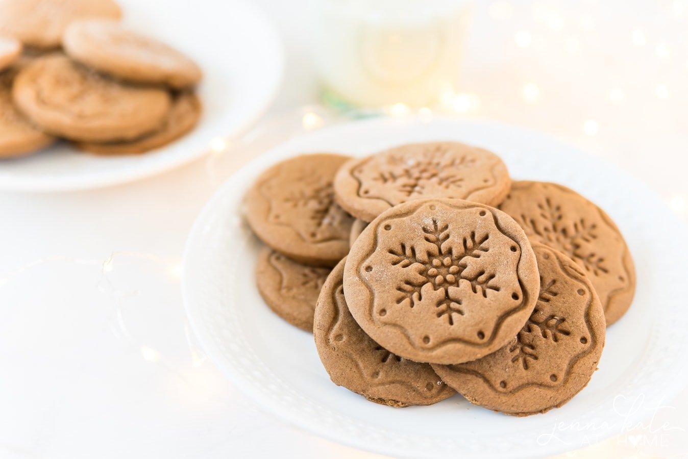 soft gingerbread cookies piled on a plate