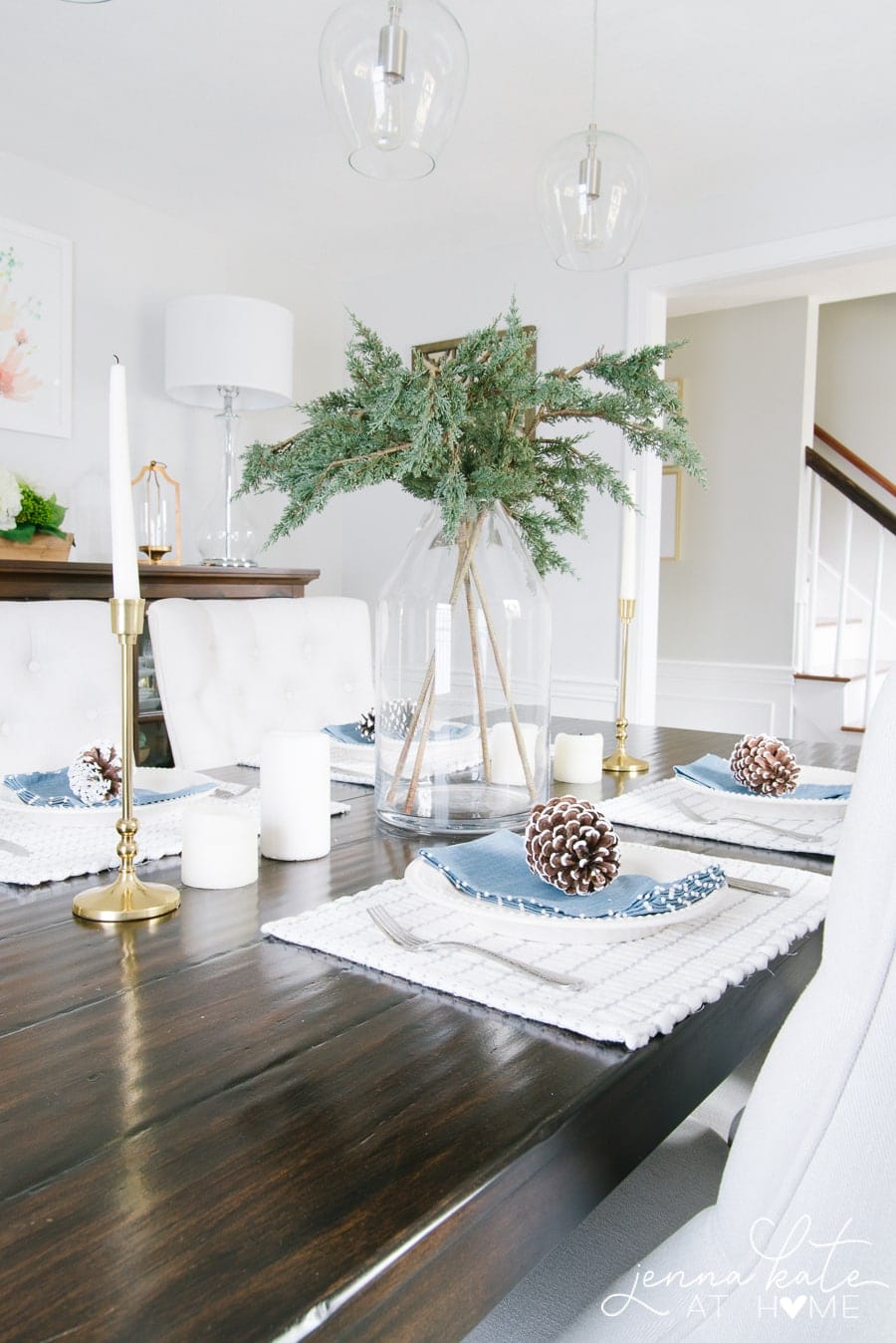 A collection of items on a dining table for a simple winter tablescape