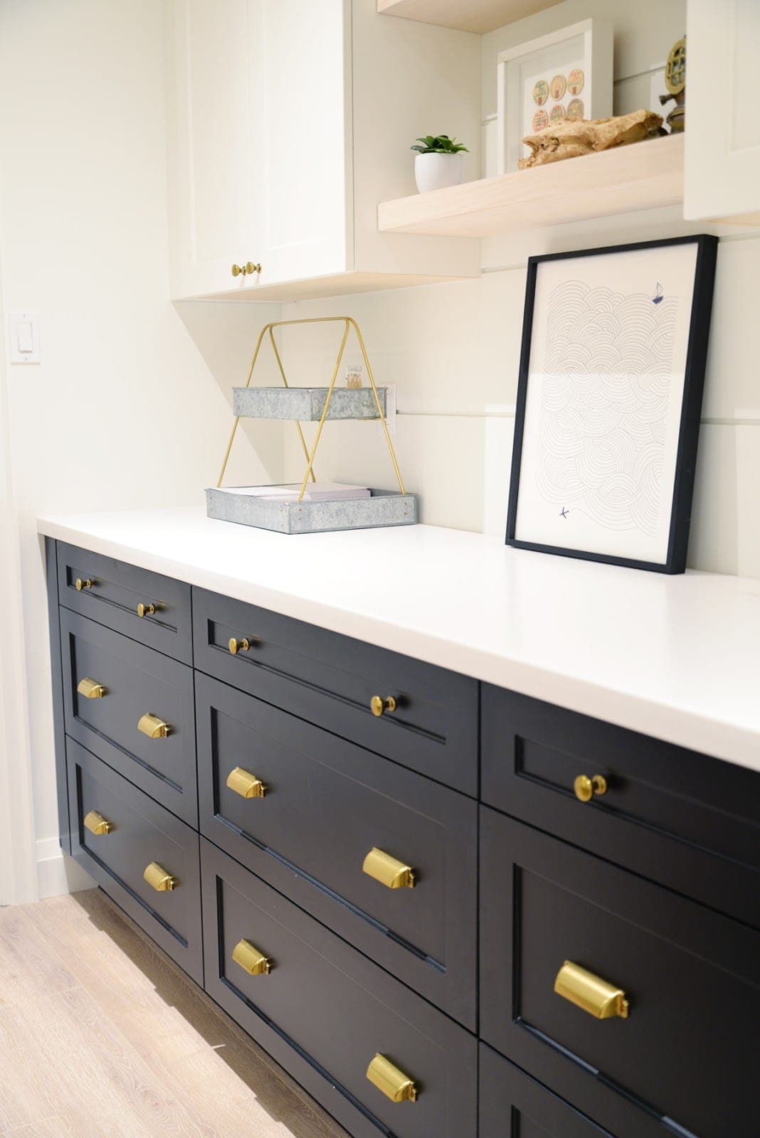 Use drawers instead of cabinets to store craft items for optimal craft room storage and organization