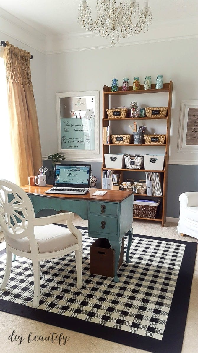 Cohesive baskets on a vintage shelving unit Craft and Office Space Reveal via DIY Beautify Jenna Kate at Home