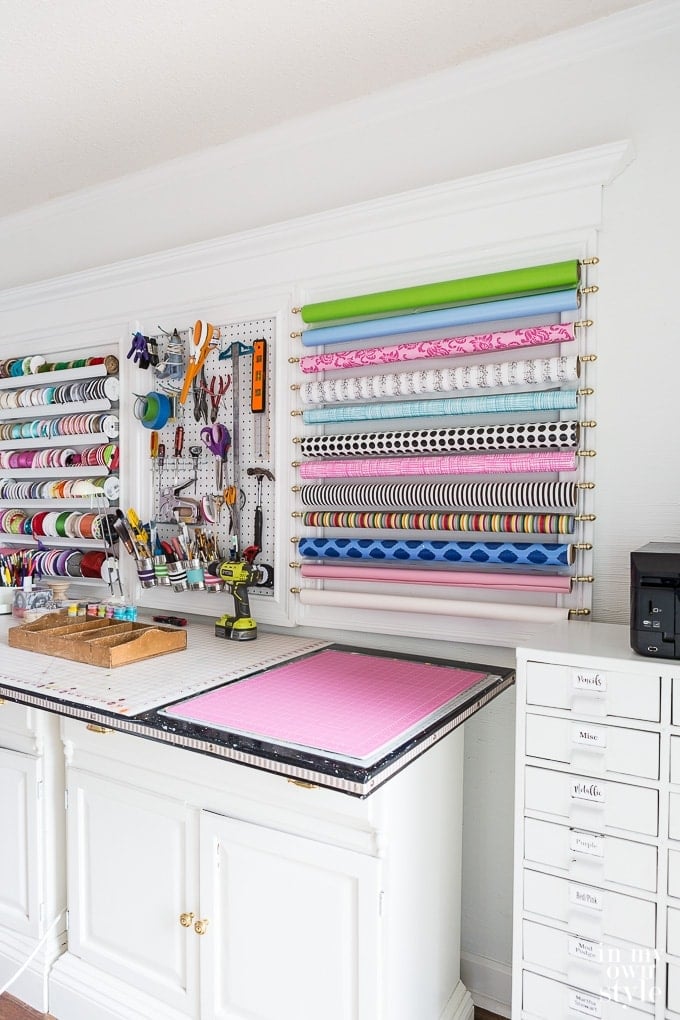 Utilize the walls when organizing your small craft room space. Create your own creative wall of storage!