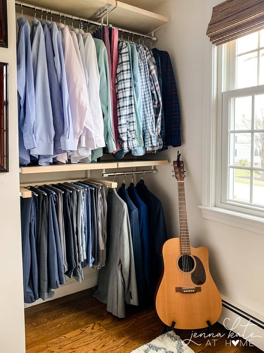 Organized closet system with men's clothing