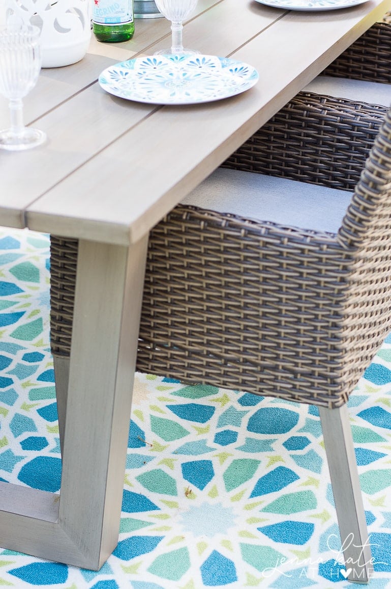 affordable, durable outdoor dinnerware on table with chairs.