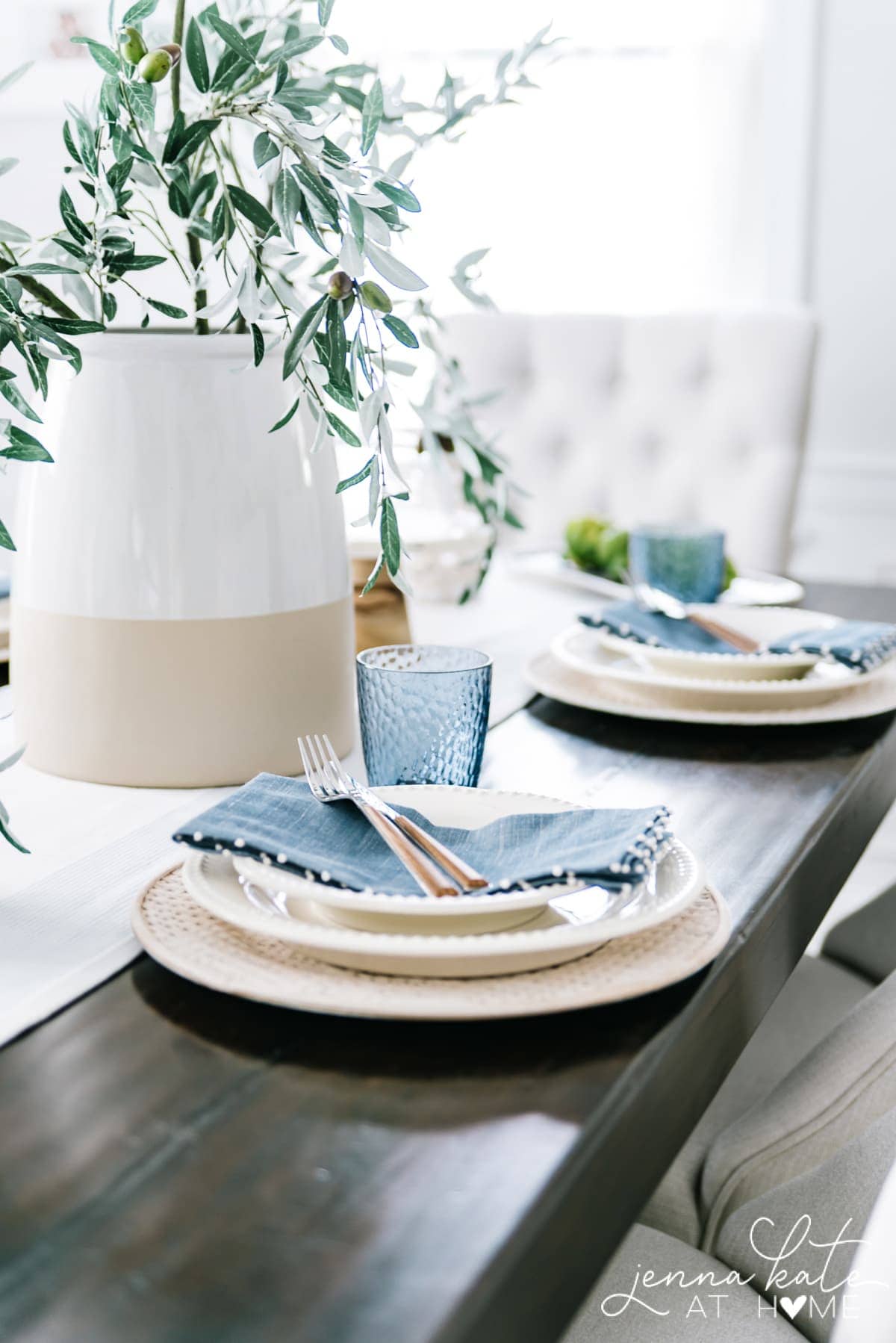 I love the light coastal blue color of these linen napkins and glassware. They add the perfect pops of color