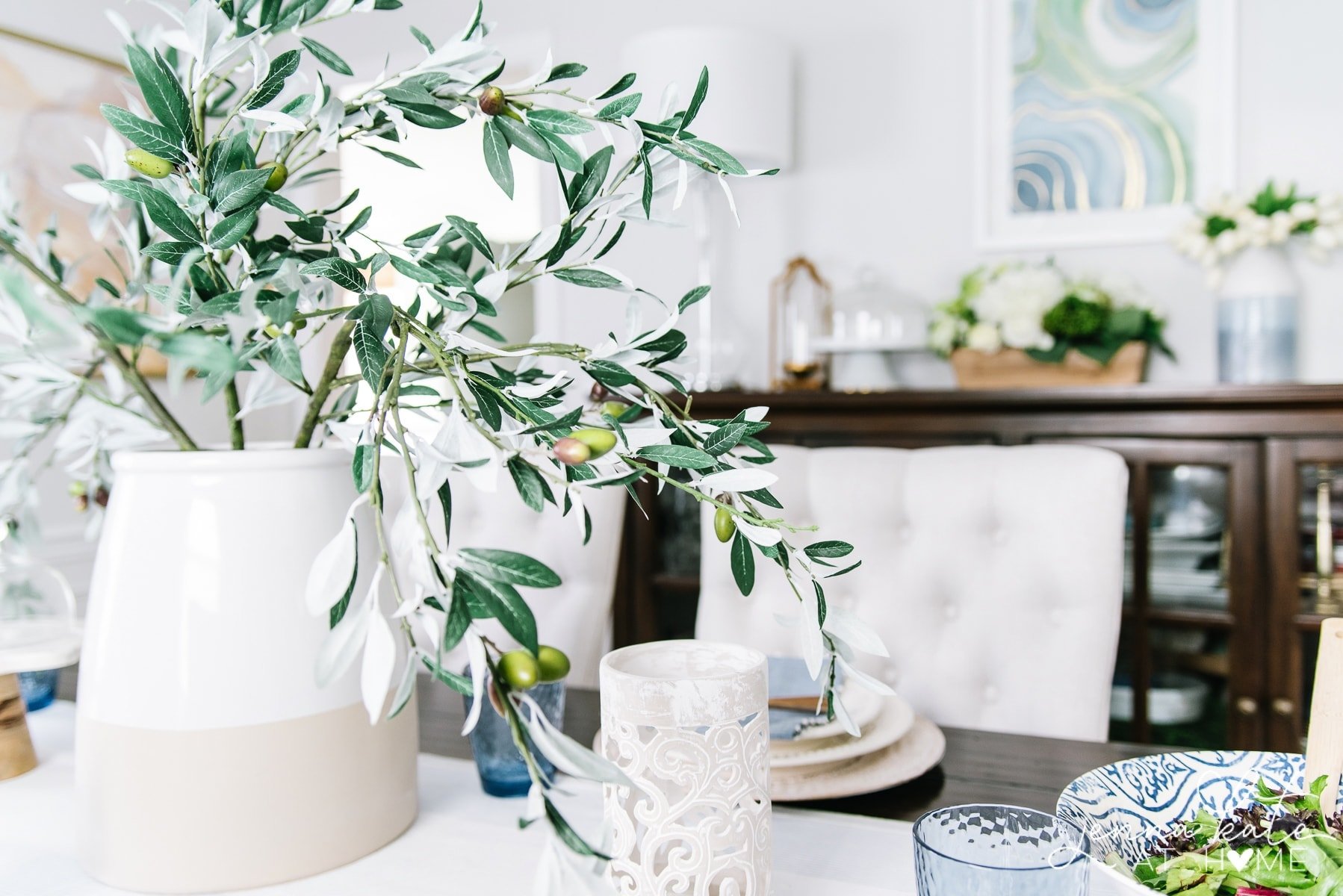 dining room with olive branch centerpiece