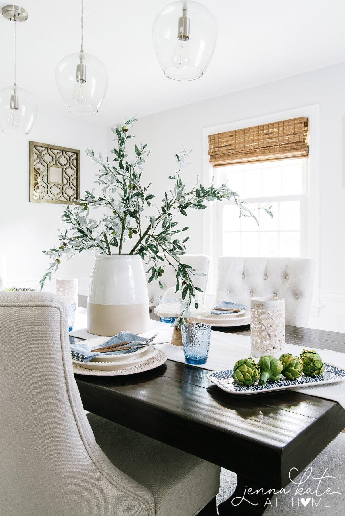 This simple summer tablescape is a perfect combination of fresh white with pops of blue and green