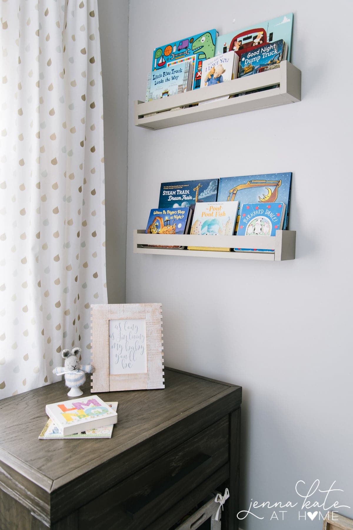 nursery with DIY book ledges on the wall filled with children\'s books
