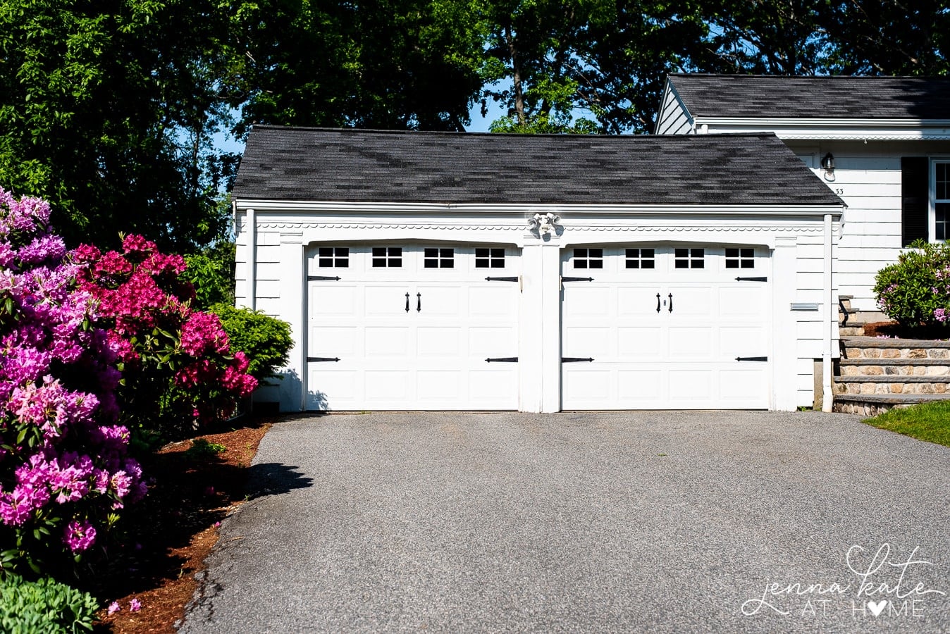 A double garage with black vinyl decals (representing windows) and plastic hardware