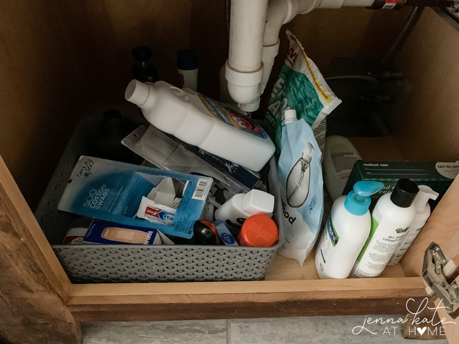 disorganized under sink bathroom storage