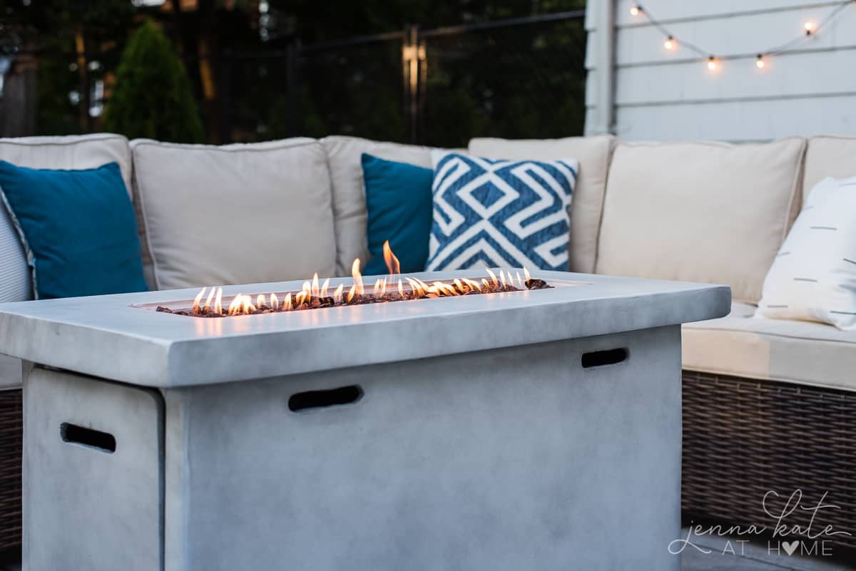 Our outdoor patio firepit warms up our coastal seating area