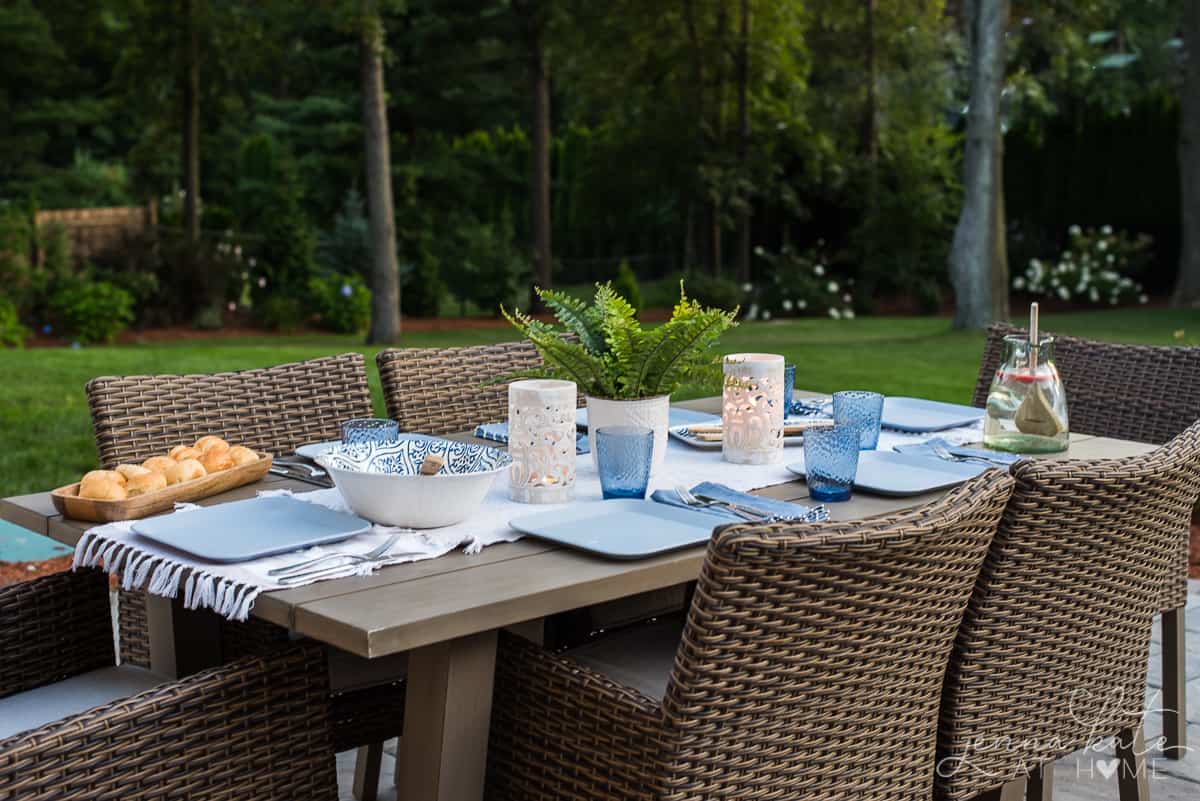 Our backyard patio dining area is surrounded by full greenery that gives this gathering area a private feel