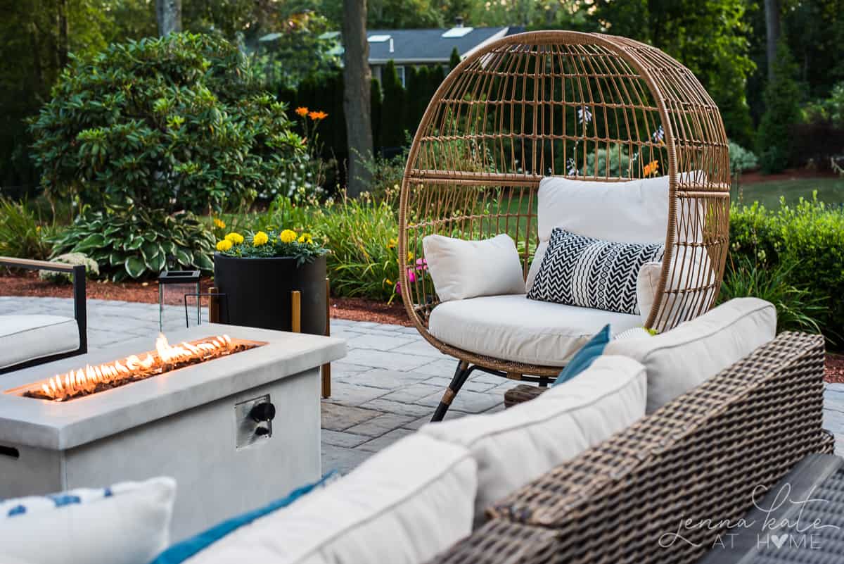 The seating areas of our outdoor patio are a modern coastal and boho style that is comfortable and inviting