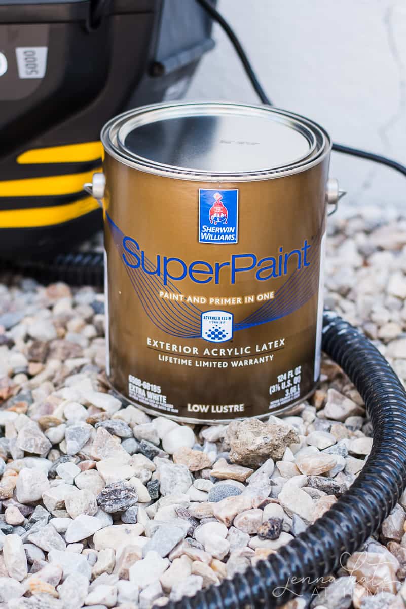 I used Sherwin Williams Superpaint exterior acrylic latex paint in extra white to paint the foundation of our house