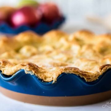 apple pie in a blue pie dish