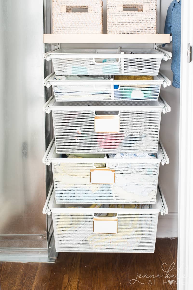 These sliding stacked wire baskets are the perfect way to organize a small nursery closet