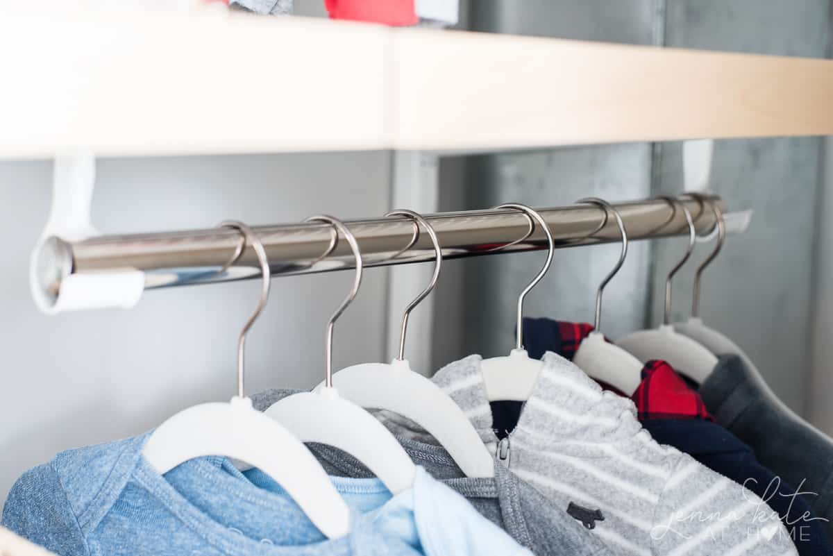 Double hung closet bars are a great way to organize a cluttered nursery closet