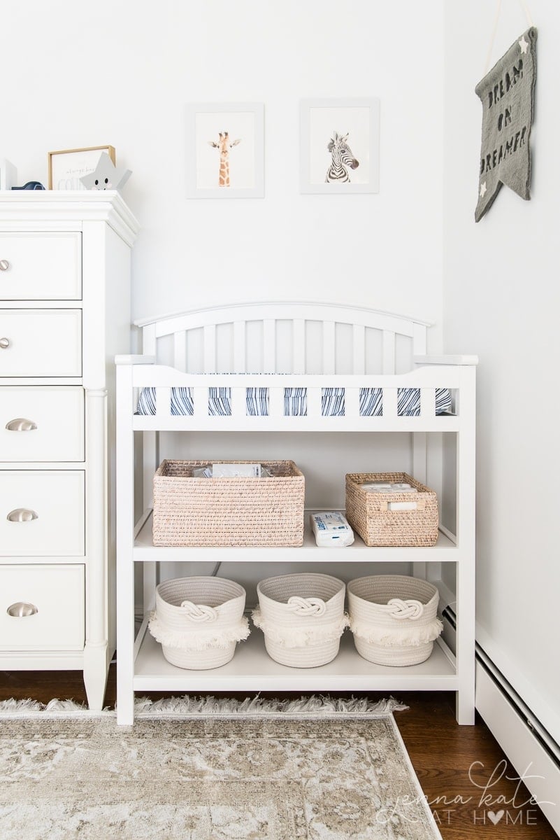 Changing table with baskets for organization