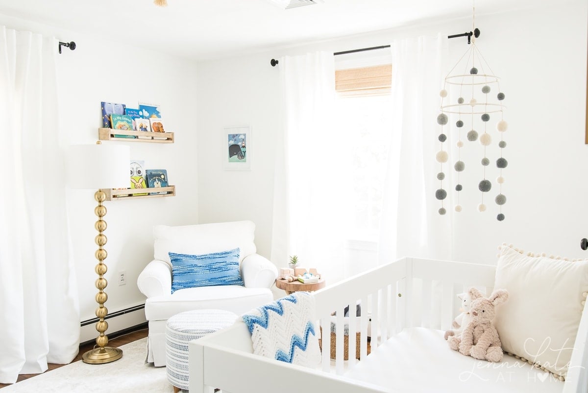 Nursery back wall with curtains and glider