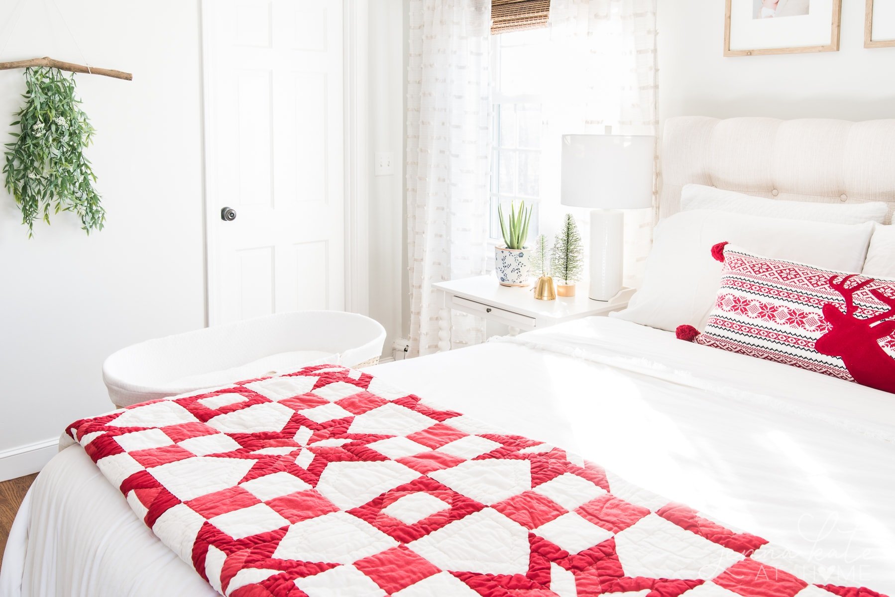 Bedroom with quilt on the bed