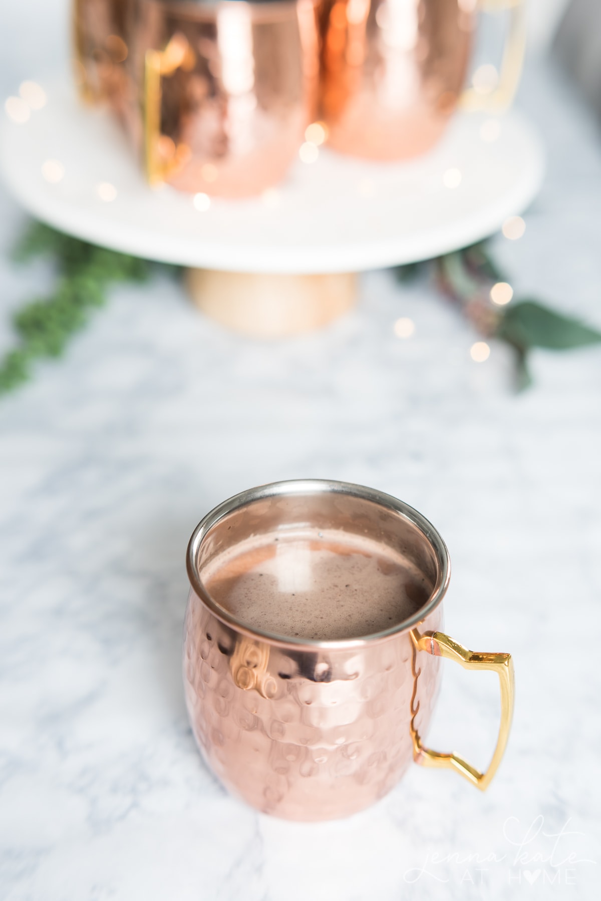 copper mug filled with hot chocolate