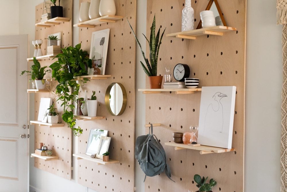 Modern DIY Pegboard display with shelves  makes great vertical storage