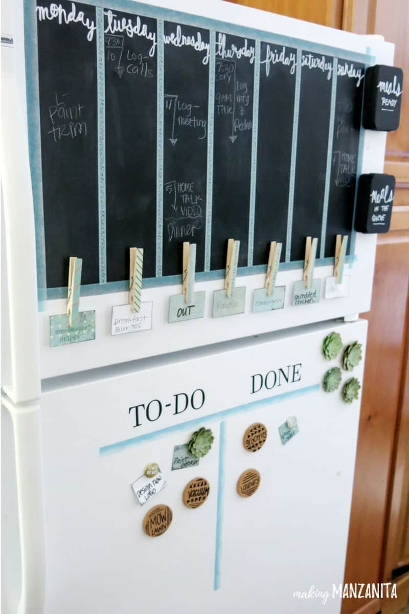Clever fridge command center idea with chalkboard, pegs and magnets
