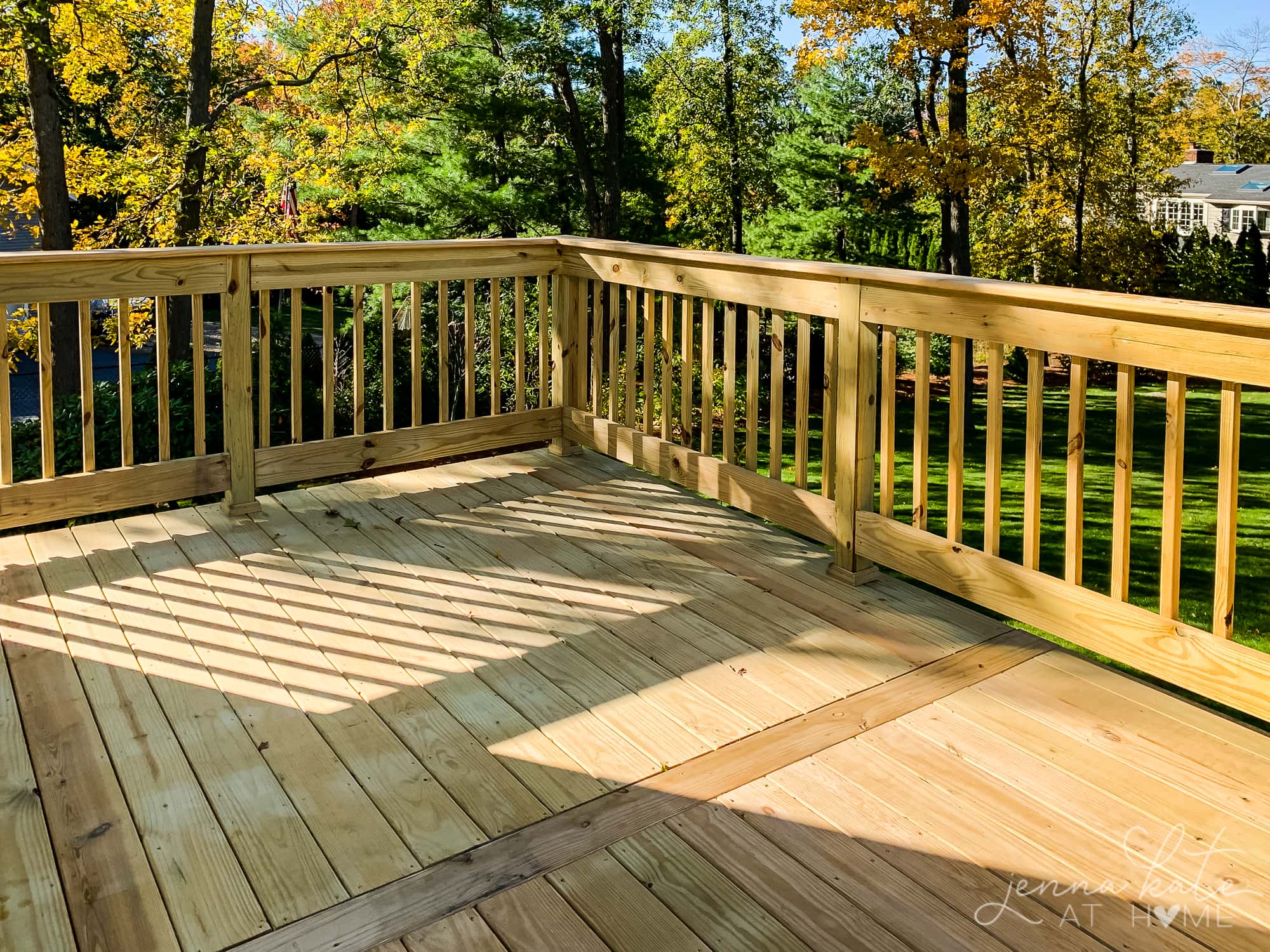 New pressure treated wood deck before paint