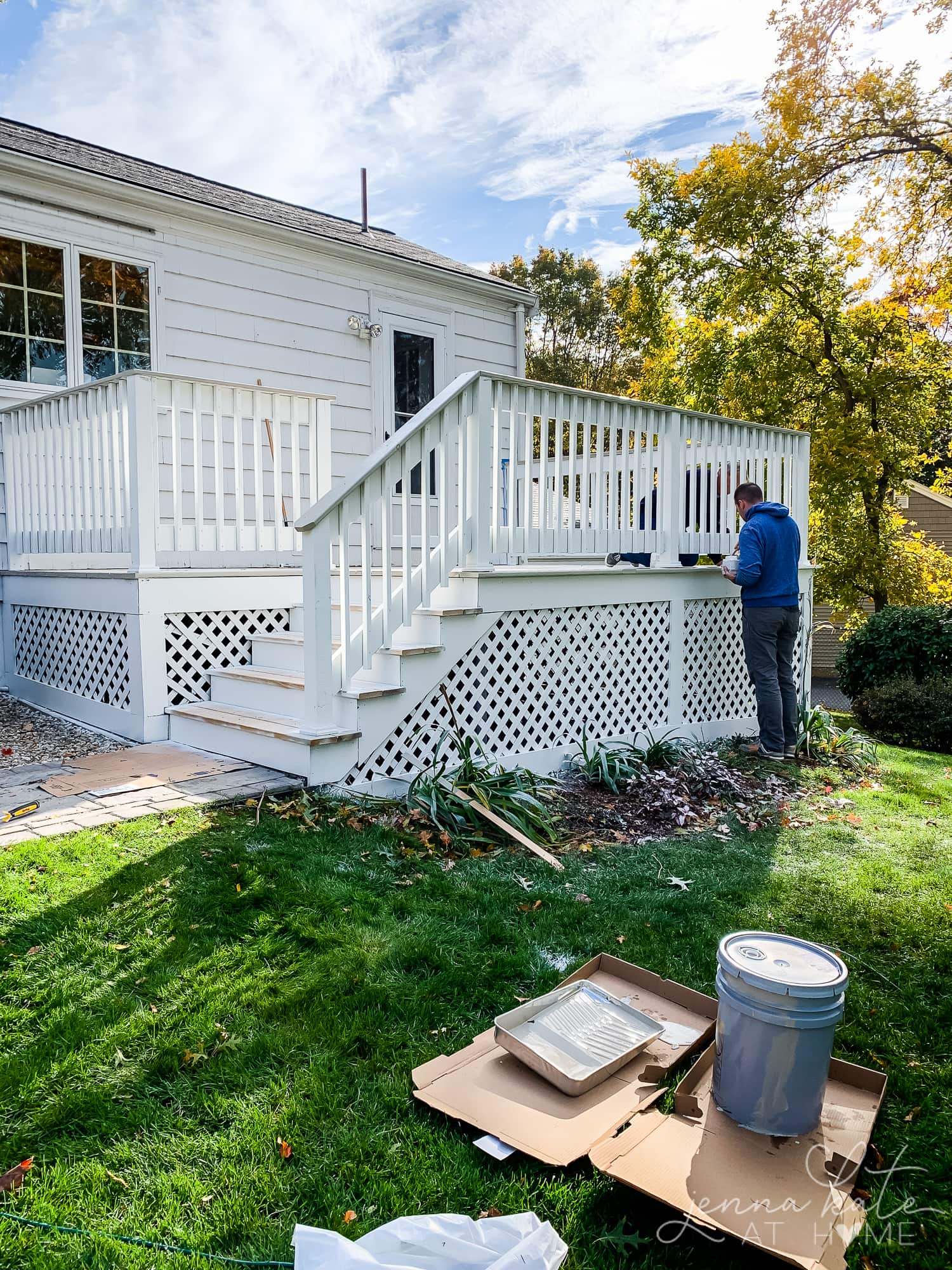 Painting the lattice on the side of the deck white 