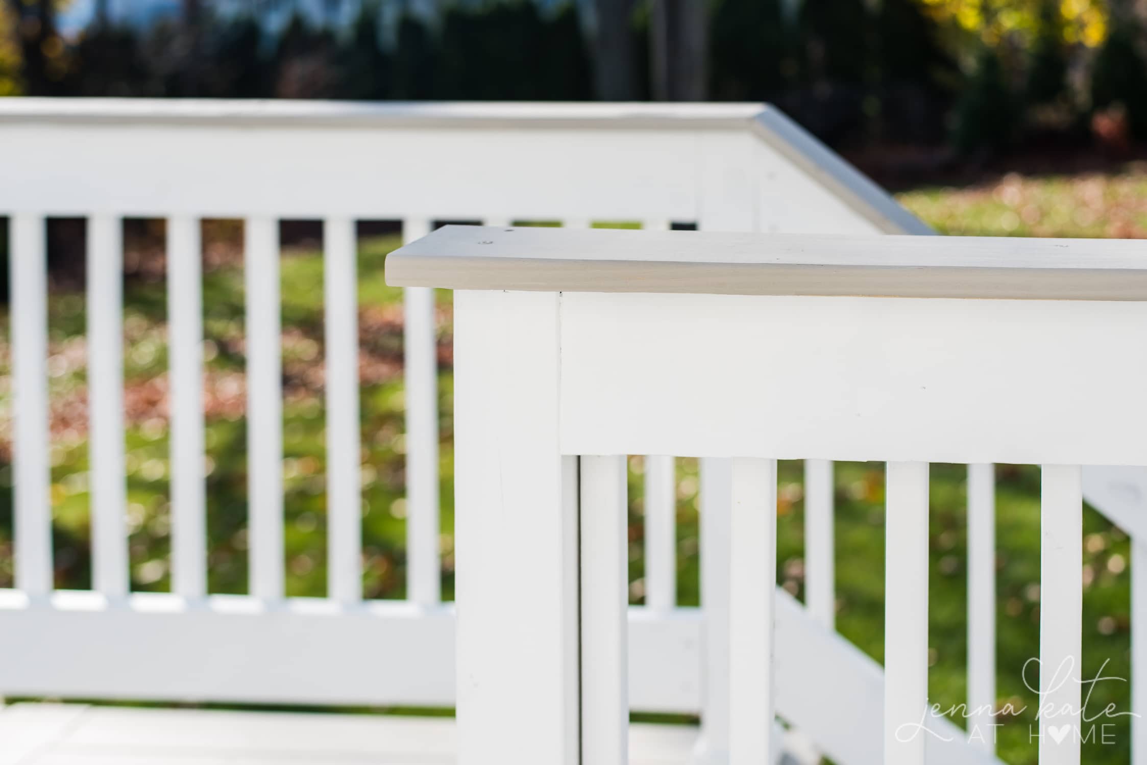 Wood deck painted Sherwin Williams Extra White with the Intellectual Gray as the contrasting color