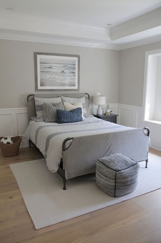 Coastal bedroom with revere pewter walls and white wainscoting
