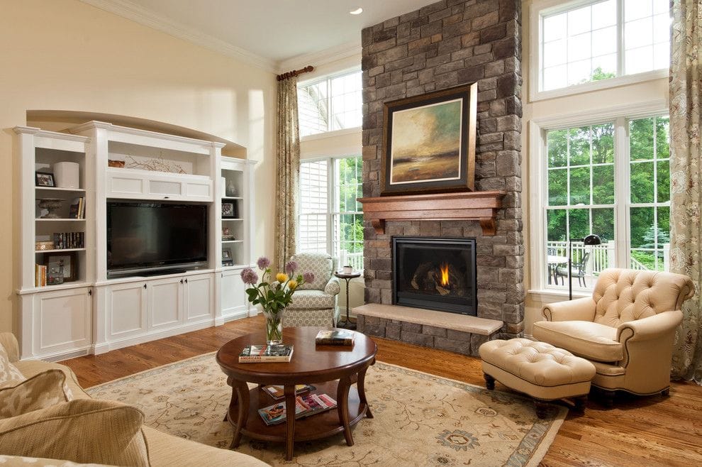 Traditional living room with brick fireplace and Revere Pewter on the walls