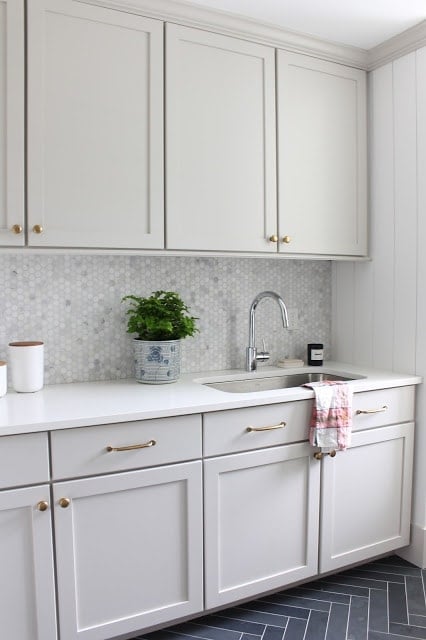 Laundry room cabinets painted Sherwin Williams Agreeable Gray