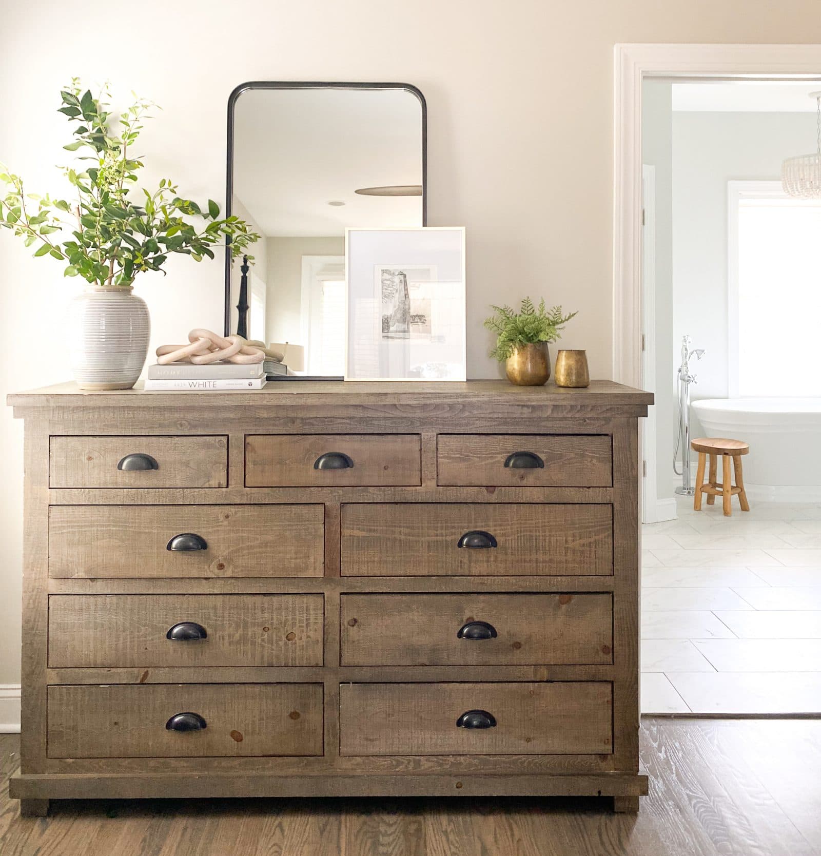 Wood dresser with agreeable gray walls behind