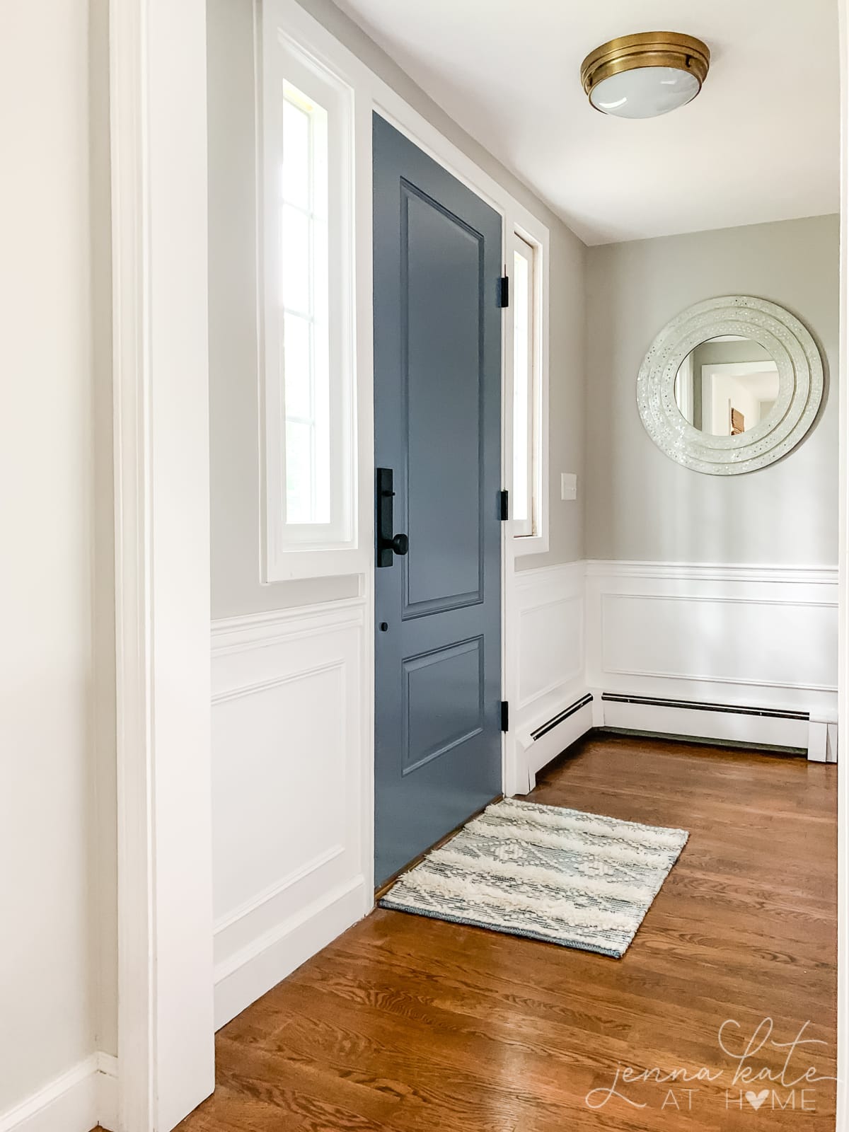 interior of front door painted Benjamin Moore Britannia Blue.