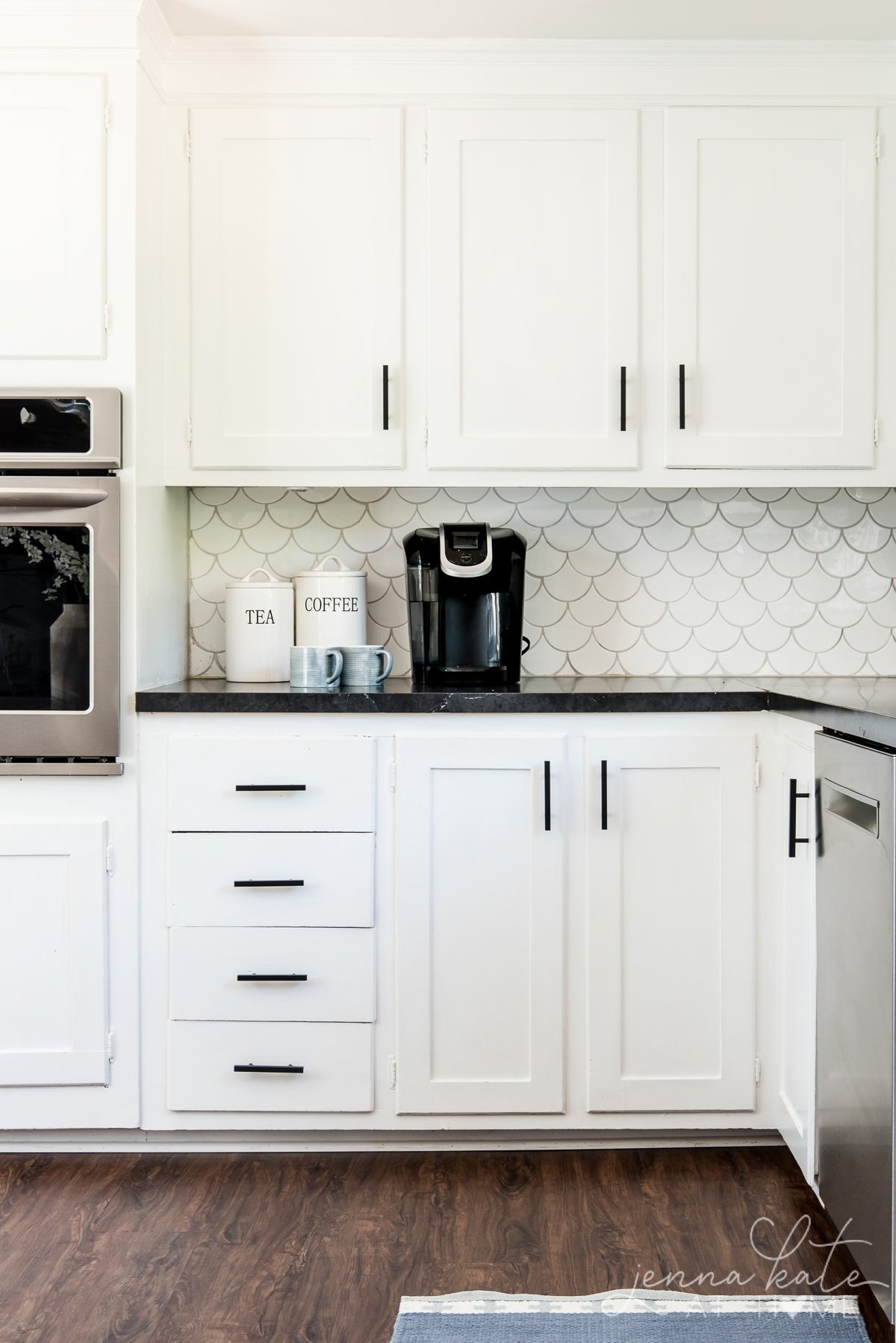 sherwin williams extra white kitchen cabinets with black hardware