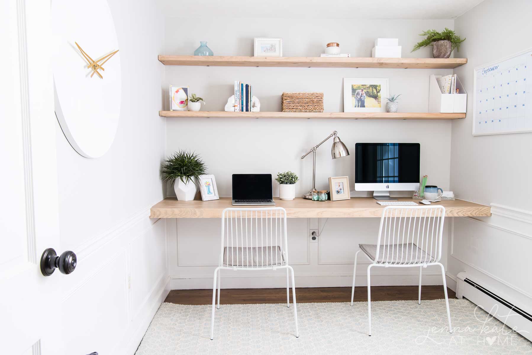 DIY floating wall desk with matching floating shelves in a small home office.