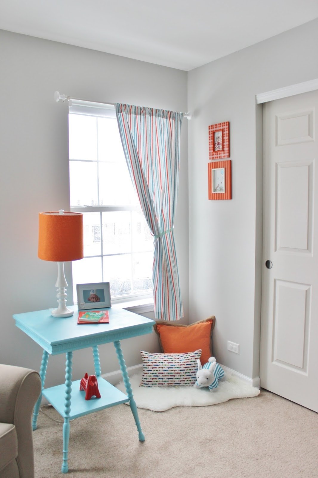 gray owl nursery with aqua and orange accents