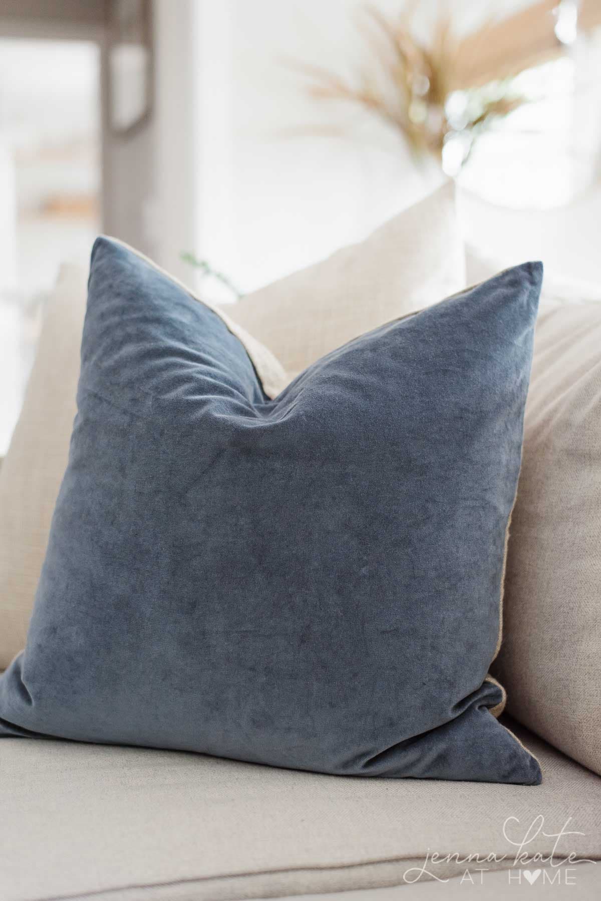 Buy throw pillow covers with the inserts because they are easy to store
