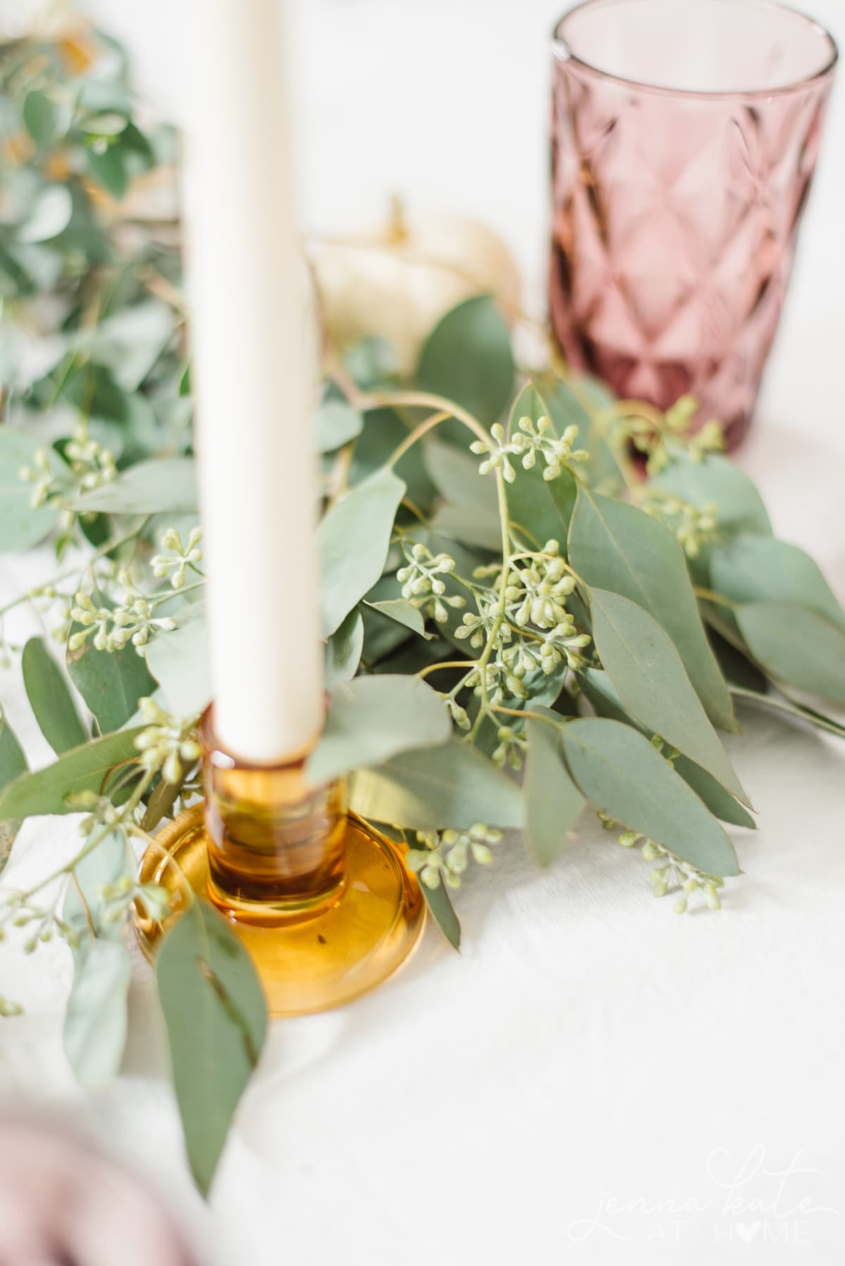 Seeded eucalyptus is the perfect table runner for a fall tablescape