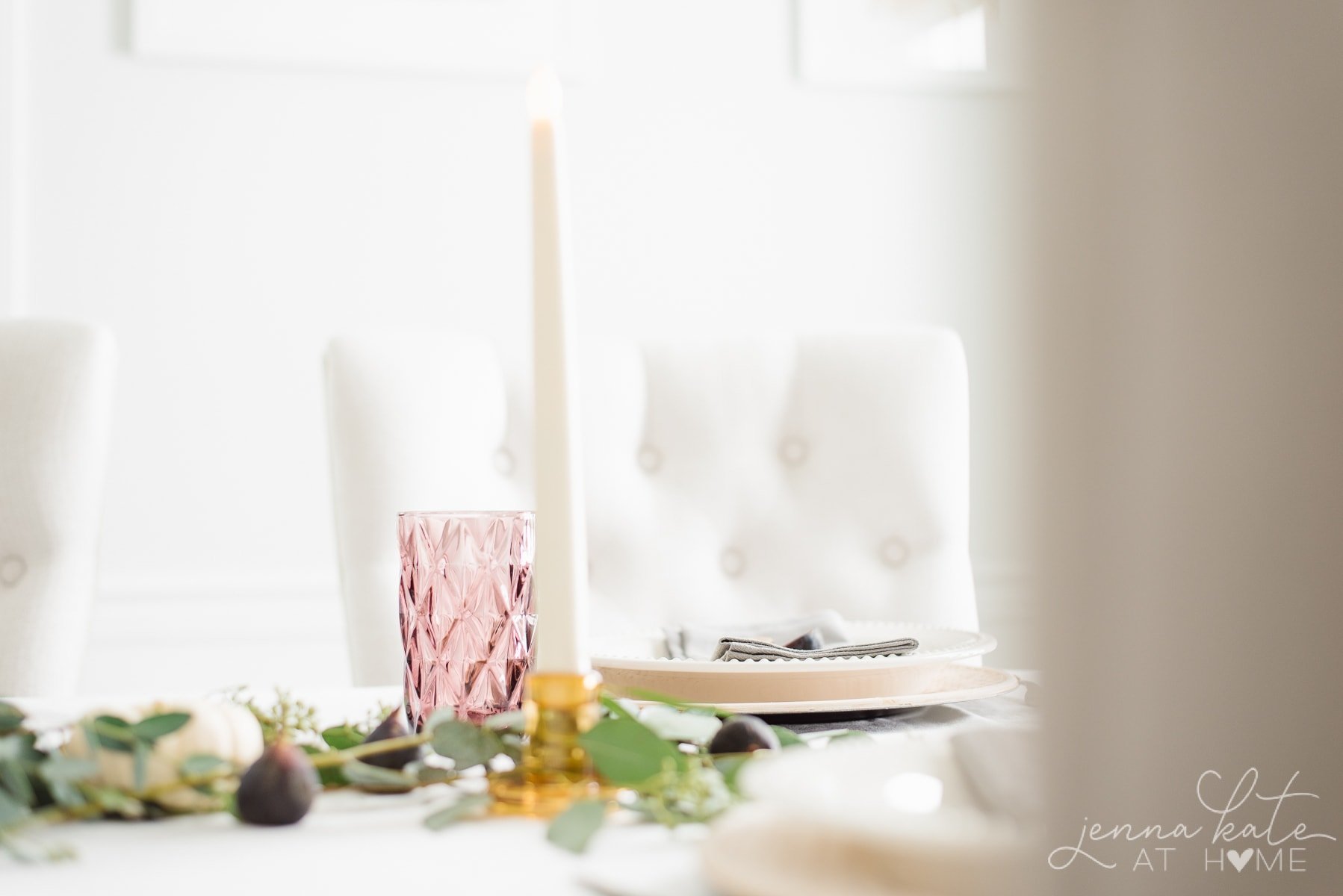 Plum colored glassware and amber glass tapered candle holders